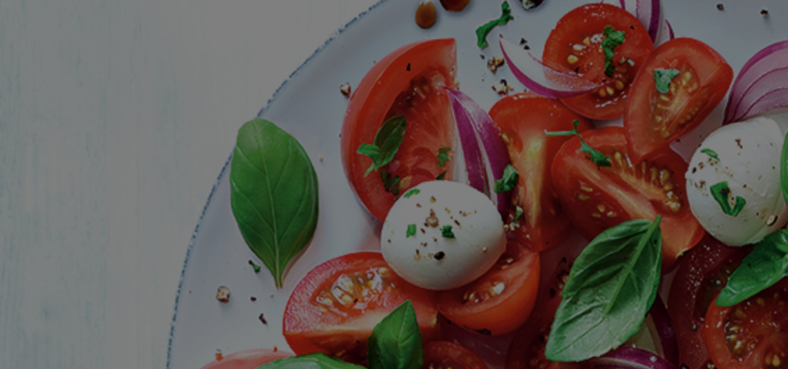 Hintergrundbild für das Balsamico Dressing: Tomate-Mozzarella-Salat 